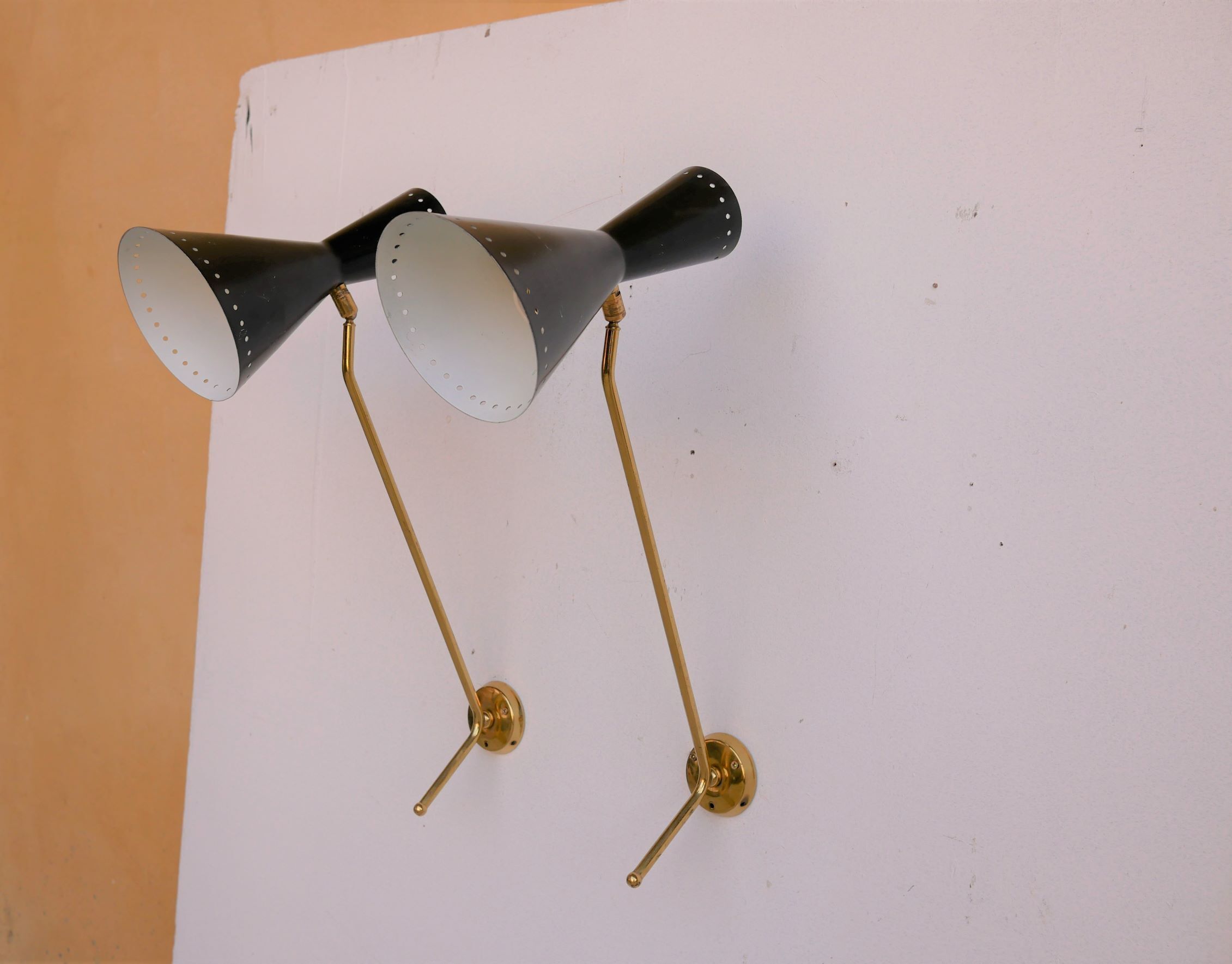 Vintage "Diabolo" wall apply in black metal and brass