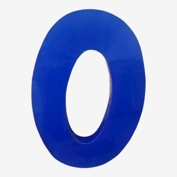 Letter O sign in blue vintage plexiglass