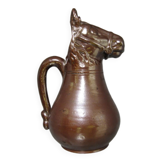 Absinthe pitcher in sandstone