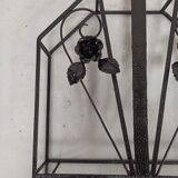 Pink-decorated iron umbrella door.