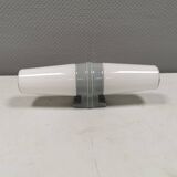 Bathroom lamp with light gray ceramic base,  and milky white opal glass.