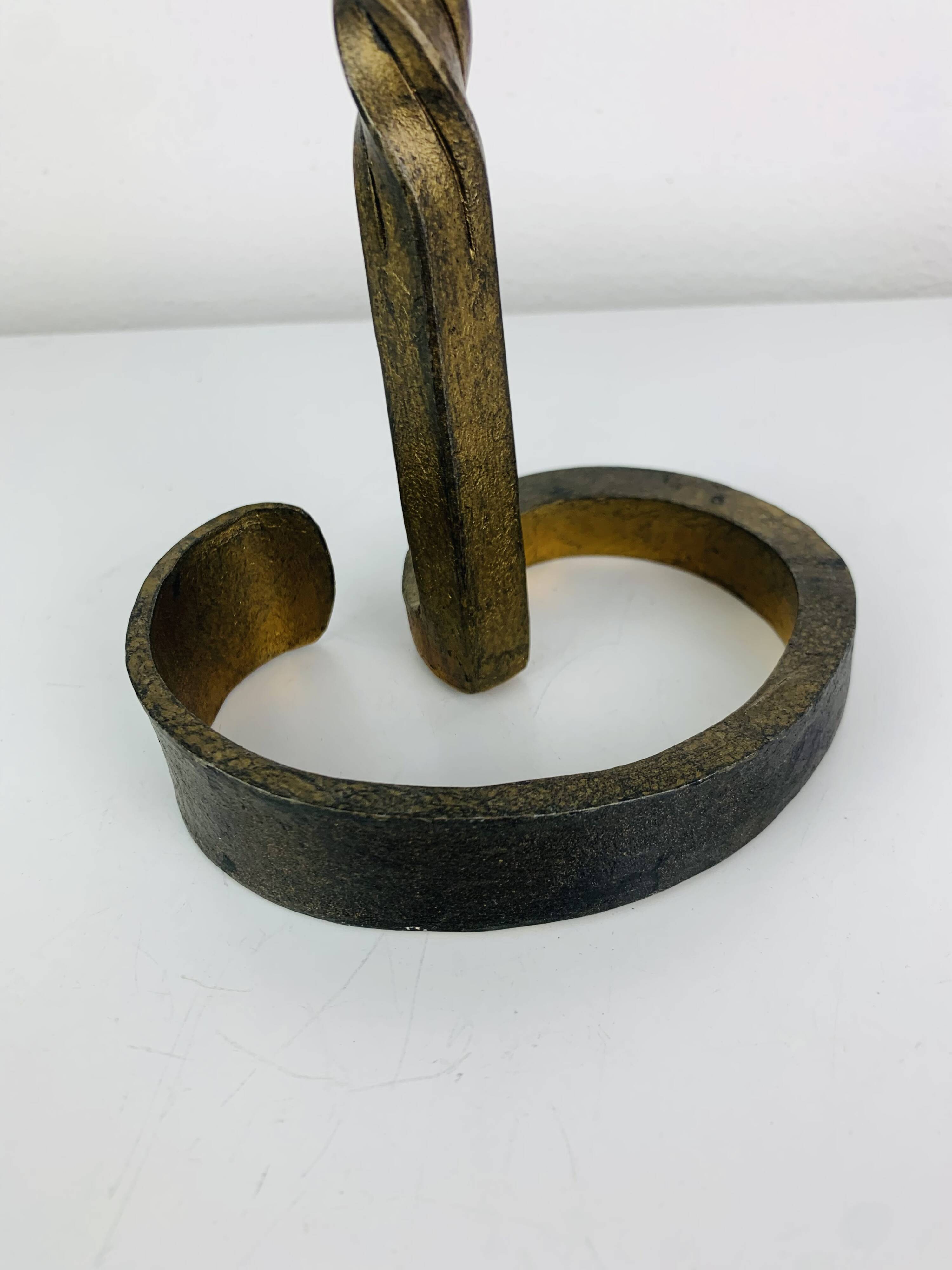 Brutalist candle holder, wrought iron with a golden patina.