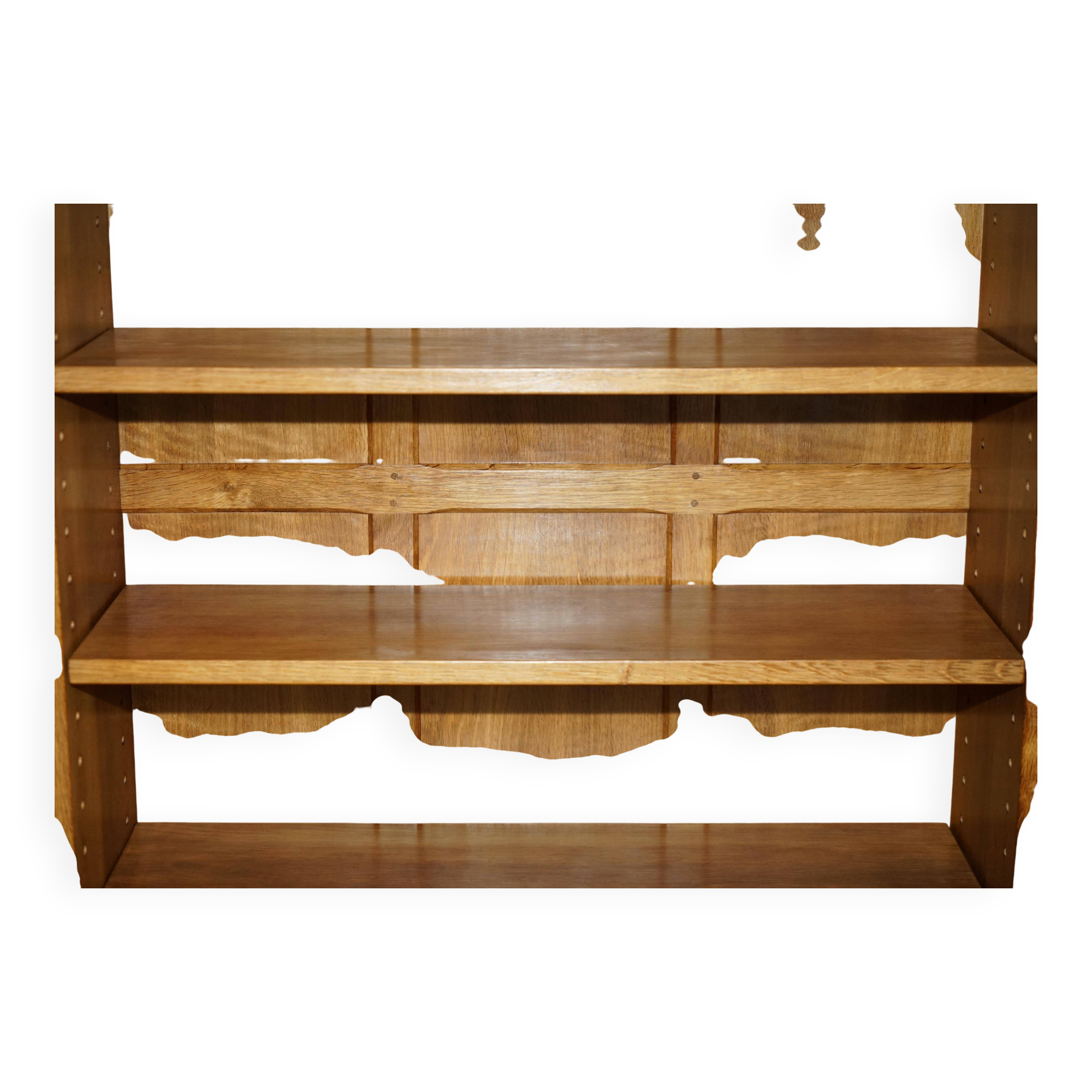 Pair of Robert Mouseman Thompson oak carved bookshelves.
