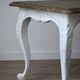 Table basse chêne piètement blanc