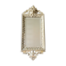 Bevelled bronze wall mirror, with character head, Louis XVI style 22X54cm