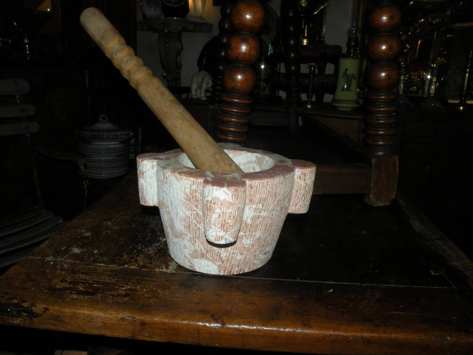 Mortar in veined red marble and its wooden pestle 20th century