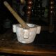 Mortar in veined red marble and its wooden pestle 20th century
