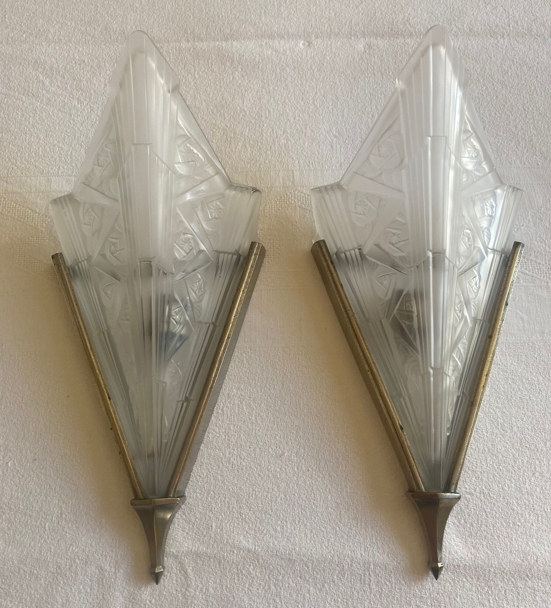 Pair of art deco metal and satin pressed glass sconces