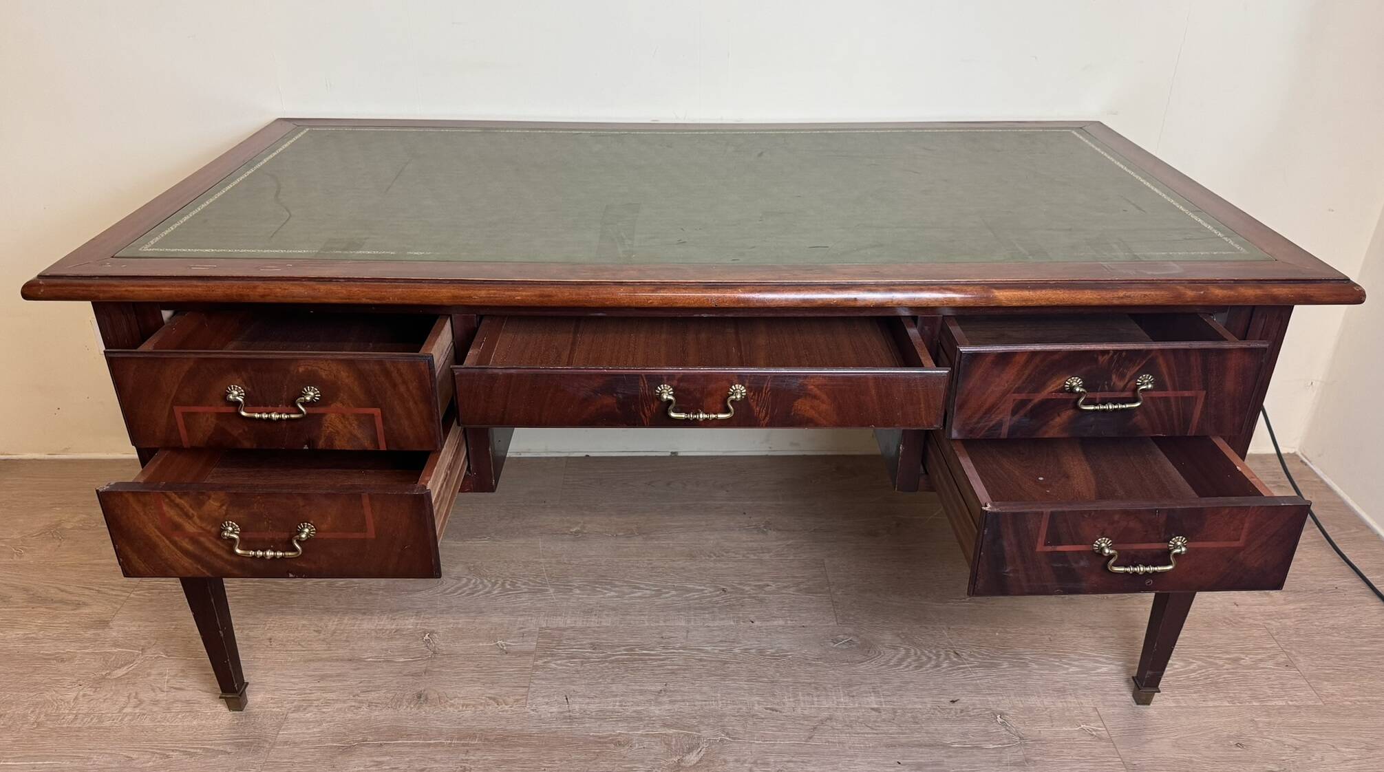 Very large Louis XVI style center minister desk in mahogany and fillets