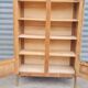 Armoire pied compas en chêne blond