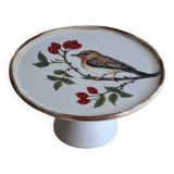 Cake display on pedestal with bird decor