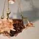 Bronze three-armed chandelier with a grape decoration.