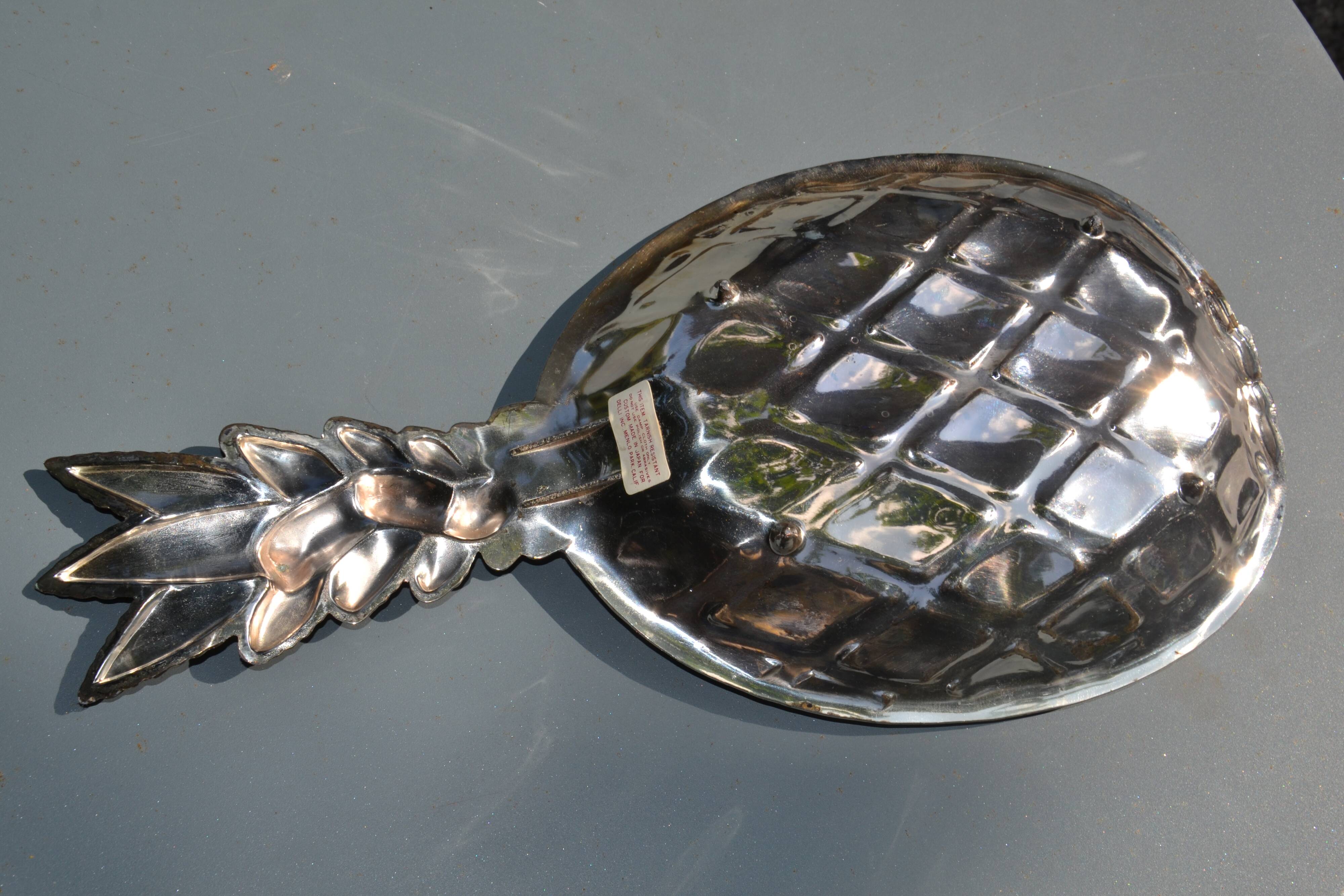 Silver-plated pineapple pocket emptier