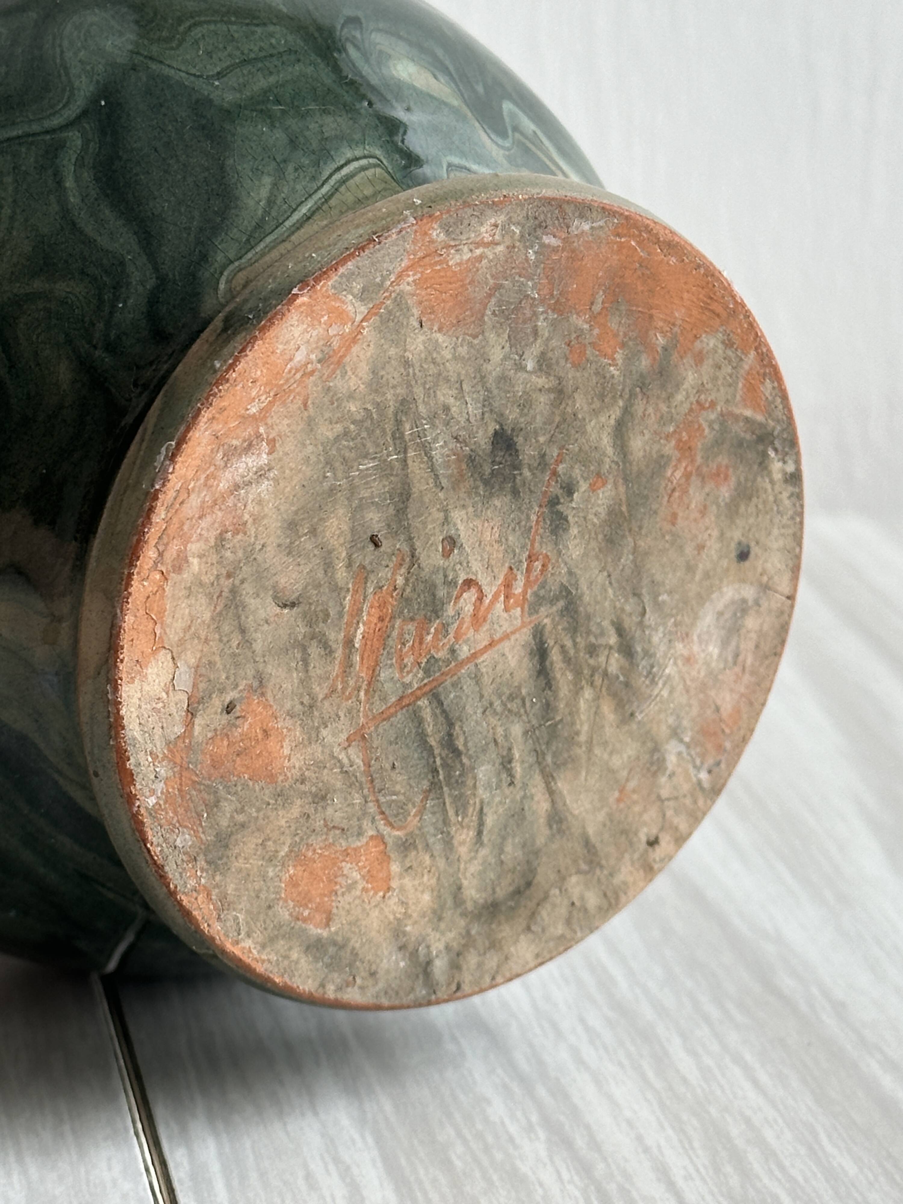 Green marbled ceramic vase