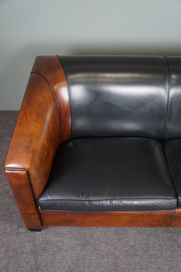 2.5-seater art deco style sofa in sheepskin
