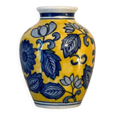 yellow porcelain vase with blue flowers
