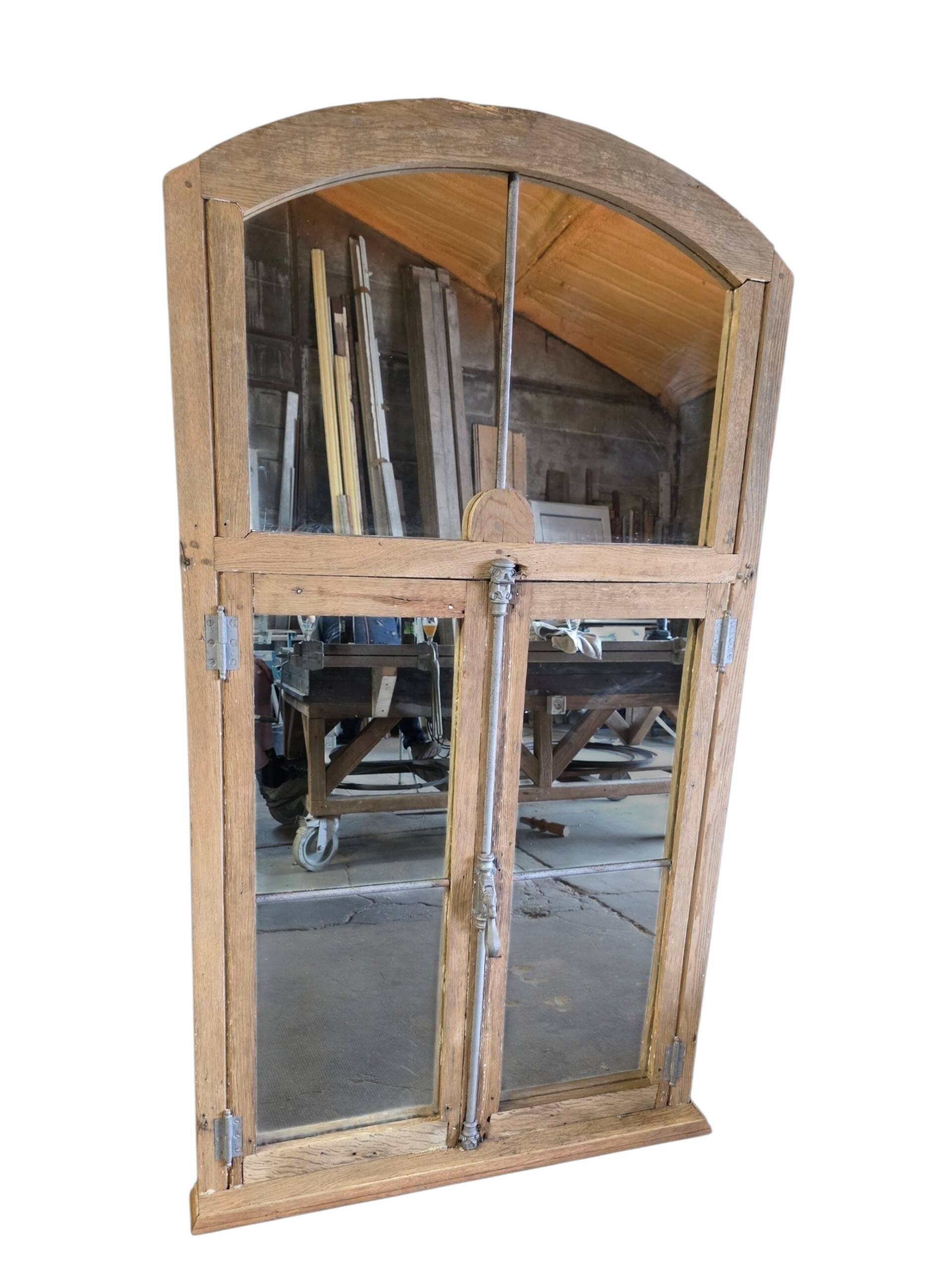Eighteenth-century oak window mirror.