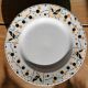 Round peedouche dish in Gien earthenware, birds and orange and black berries