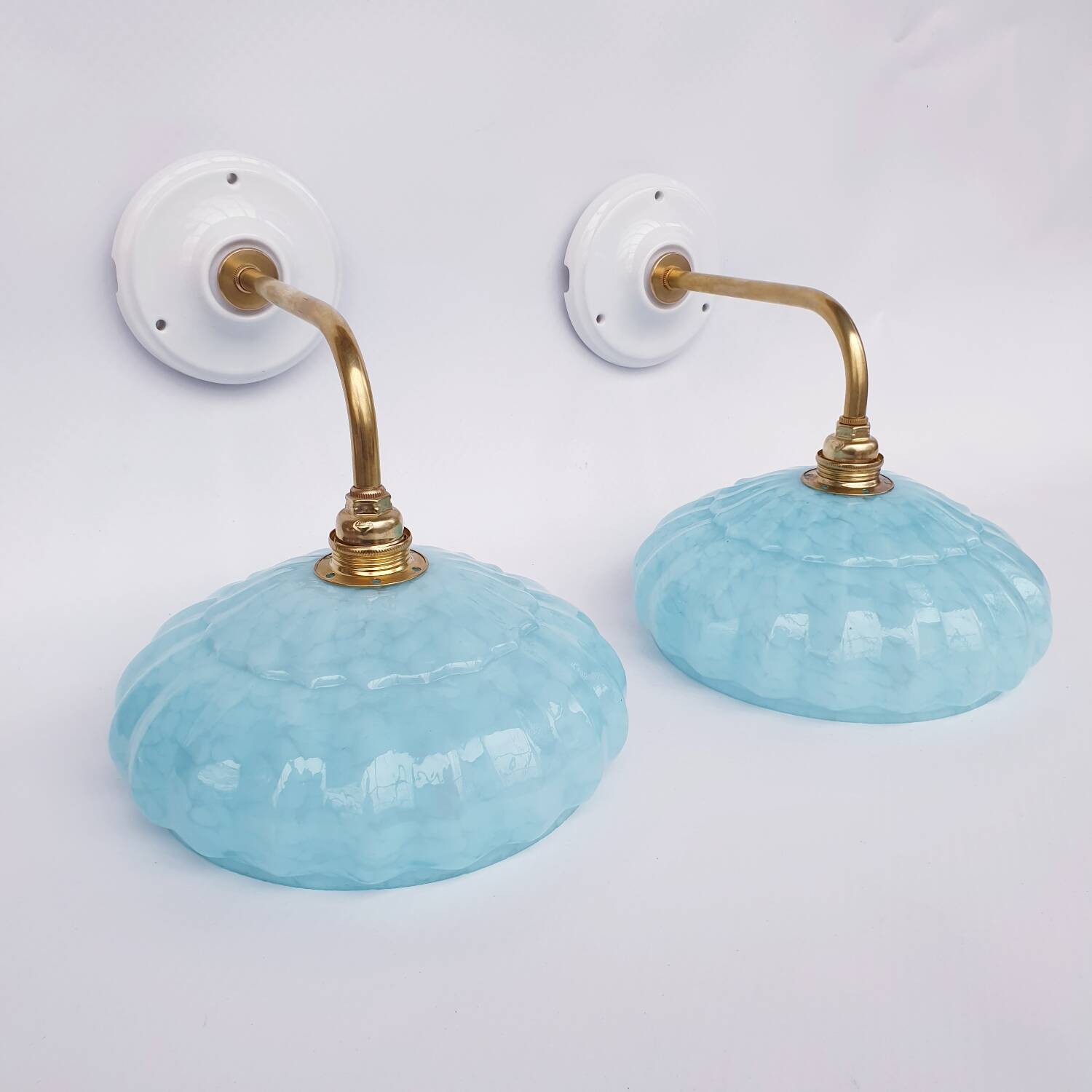 Swan neck wall lights and Clichy glass