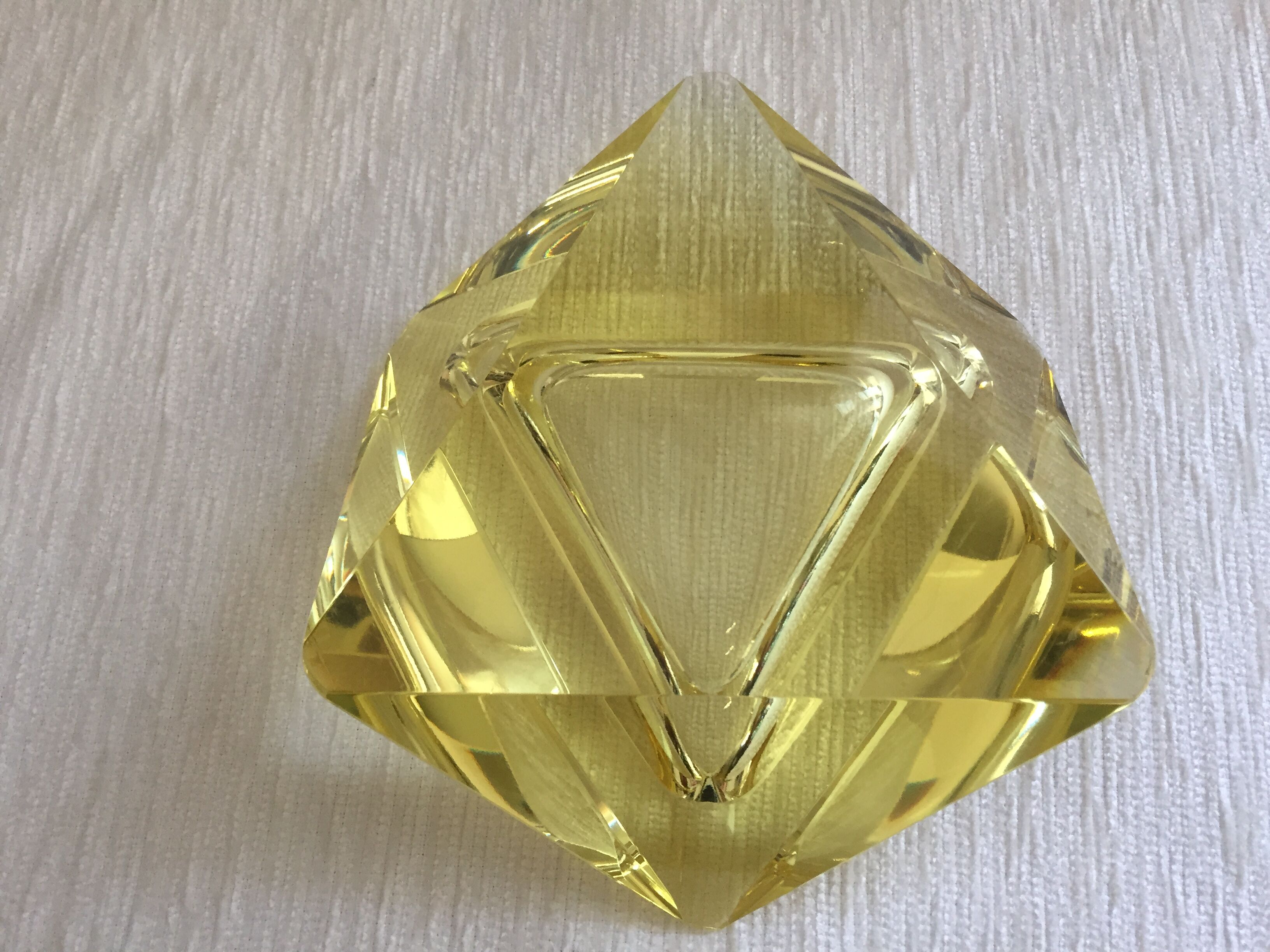 Diamond-shaped faceted ashtray