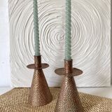 Pair of hammered copper candlesticks from the 1950s