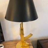 Starck gun lamp for flos