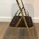 Mahogany and gold metal stool in faux-bamboo style.