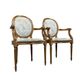 Paire de fauteuils louis XVI a dossiers médaillons