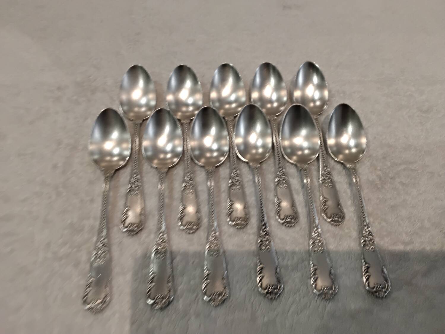 11 silver-plated metal teaspoons, Boulenger LXV scales