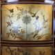 Vintage Chinese cabinet with gold leaf and flowers / oriental cabinet