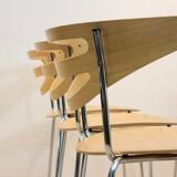 Thonet dining chairs stacked in chrome and beech