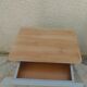 2 Louis Philippe style bedside tables reimagined in grey-green, wooden top.