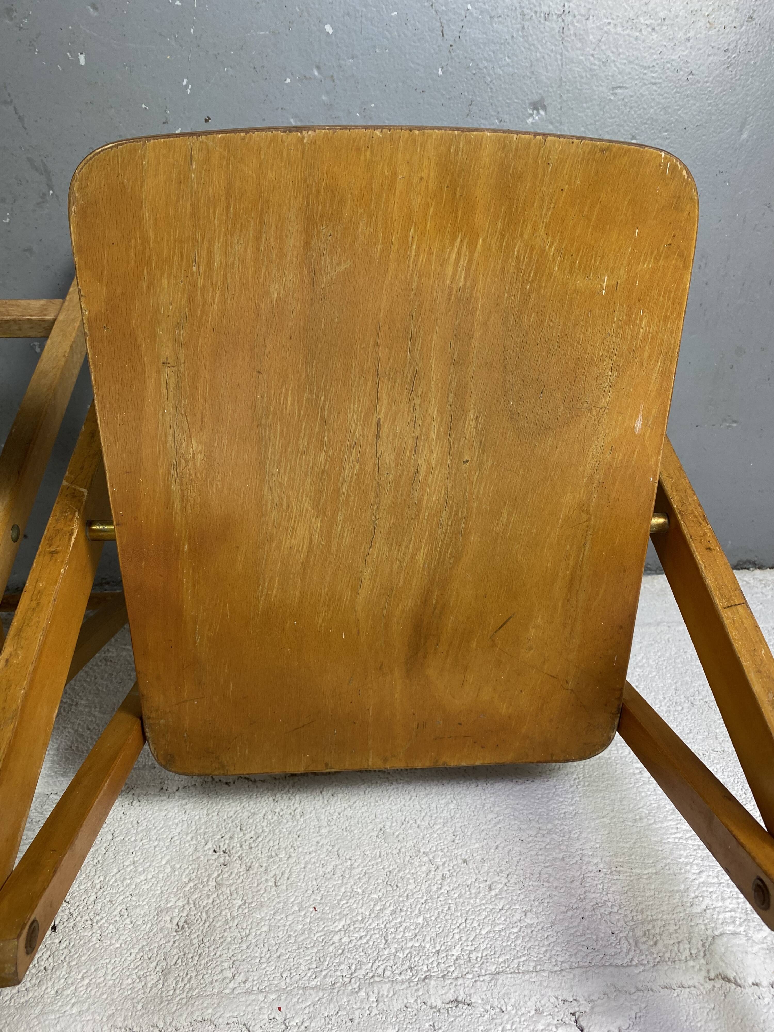 Pair of mismatched wooden folding chairs