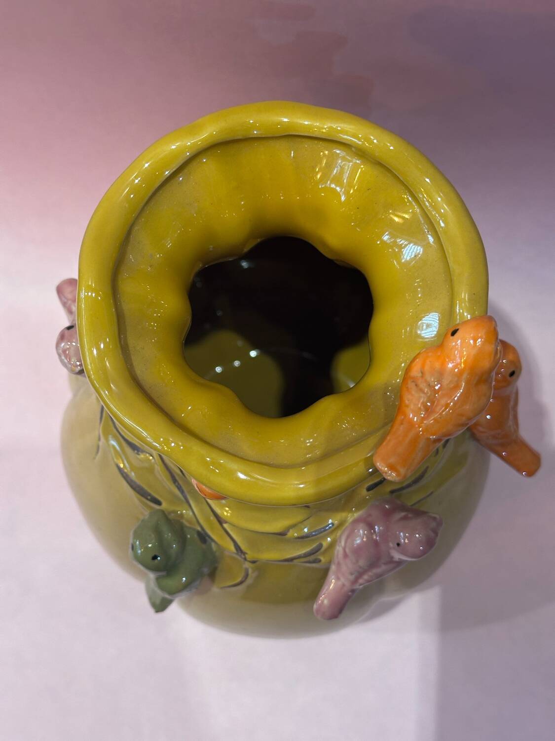 Yellow vase decorated with birds