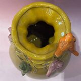 Yellow vase decorated with birds