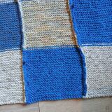 Hand knitted patchwork plaid