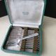 Coffret de 12 fourchettes à gâteaux en métal argenté