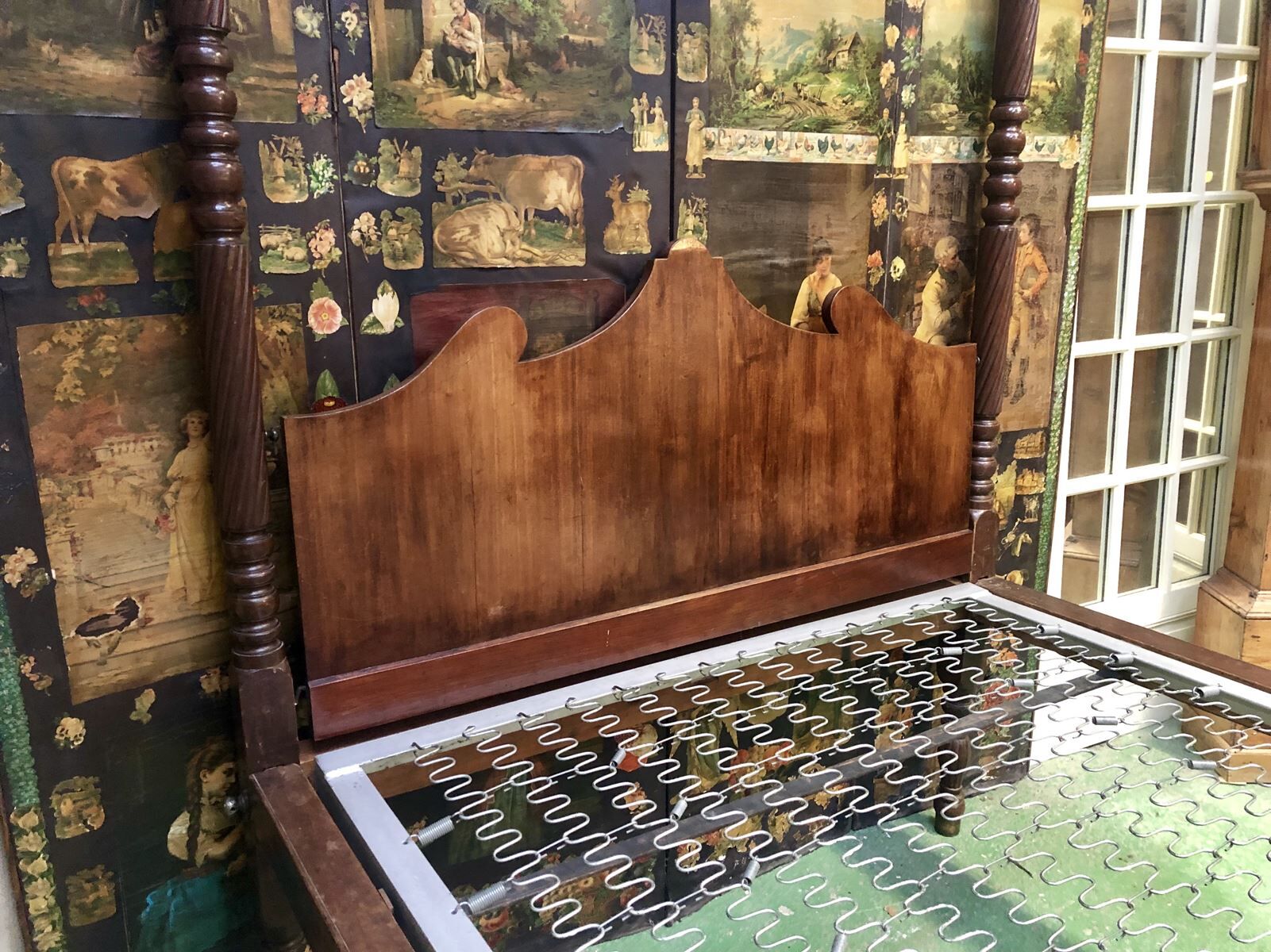 Four-poster bed in late 19th century mahogany