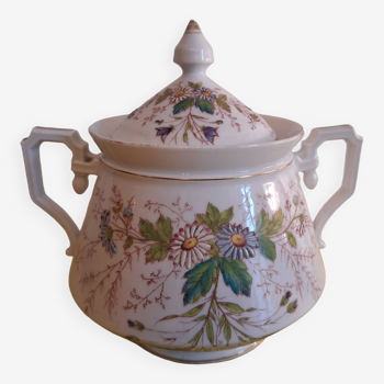 vintage porcelain sugar bowl decorated with embossed flowers