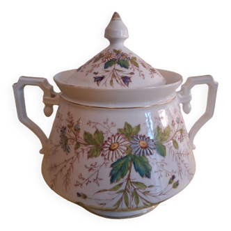 vintage porcelain sugar bowl decorated with embossed flowers