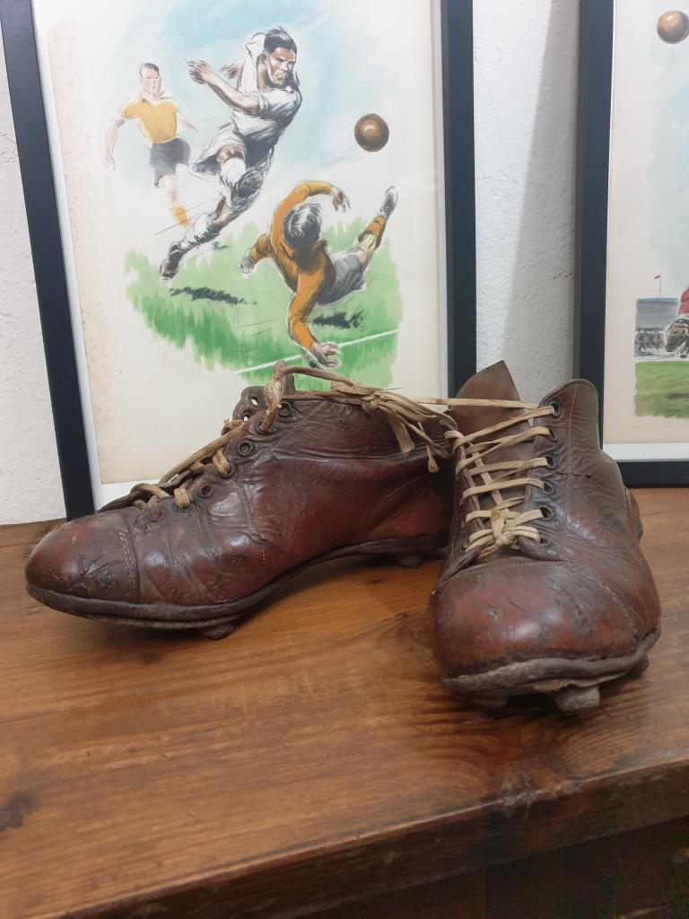 Pair of old football boots, vintage sport