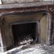 Louis XIV style fireplace in veined Carrara marble and 19th-century ceramics.