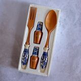 Set of wooden and ceramic salad cutlery