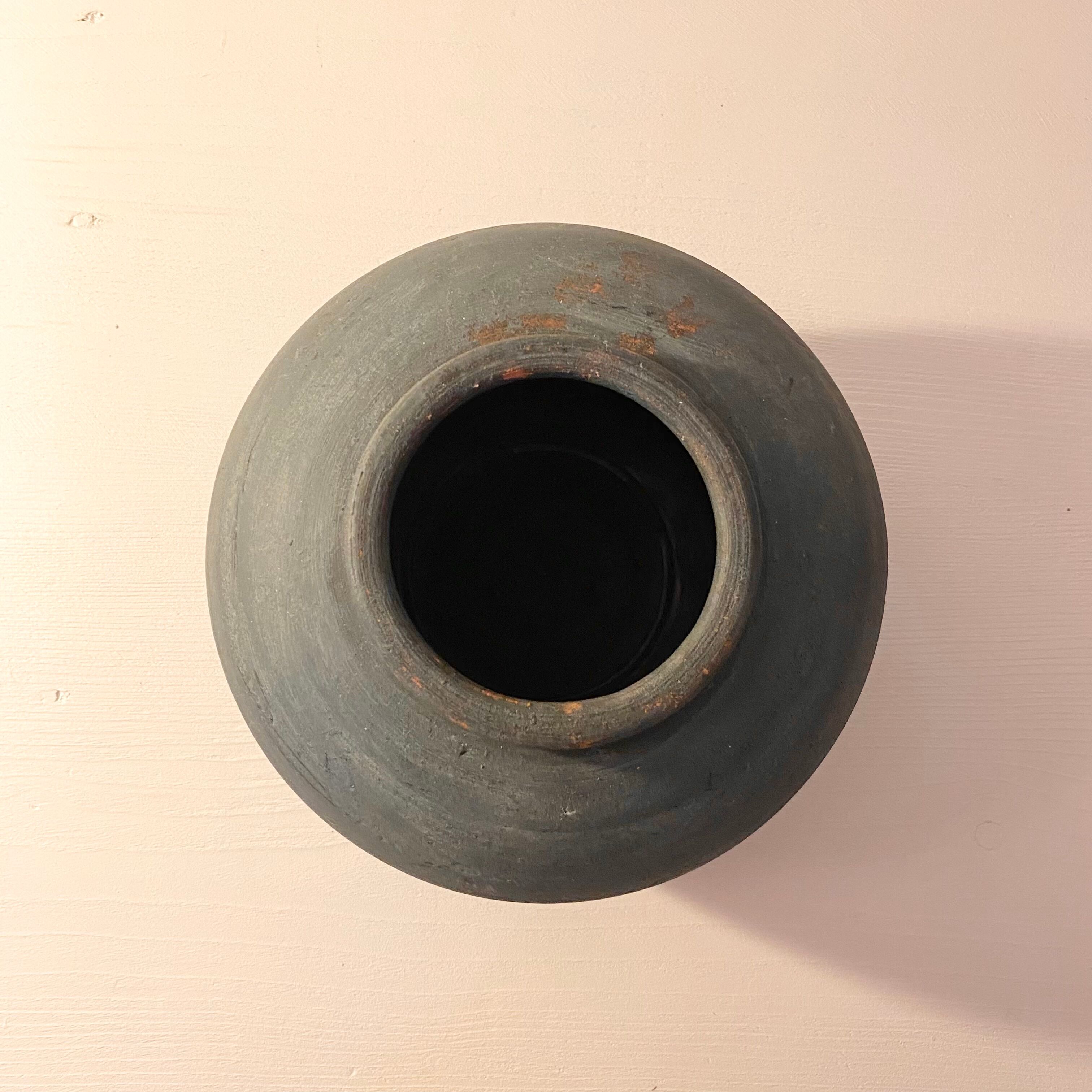 Black patinated terracotta vase