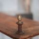 Napoleon III spool shelf, floor-standing shelf with brass tips.