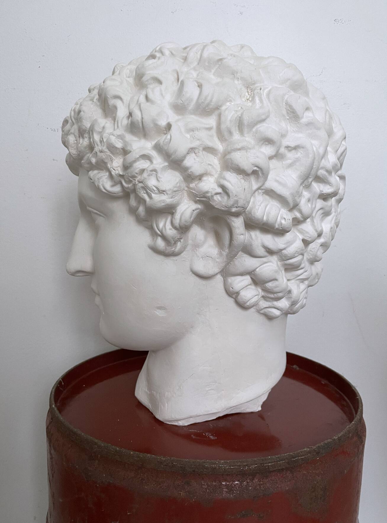 White plaster Greek head