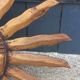 Miroir soleil en bois et stuc doré, années 50
