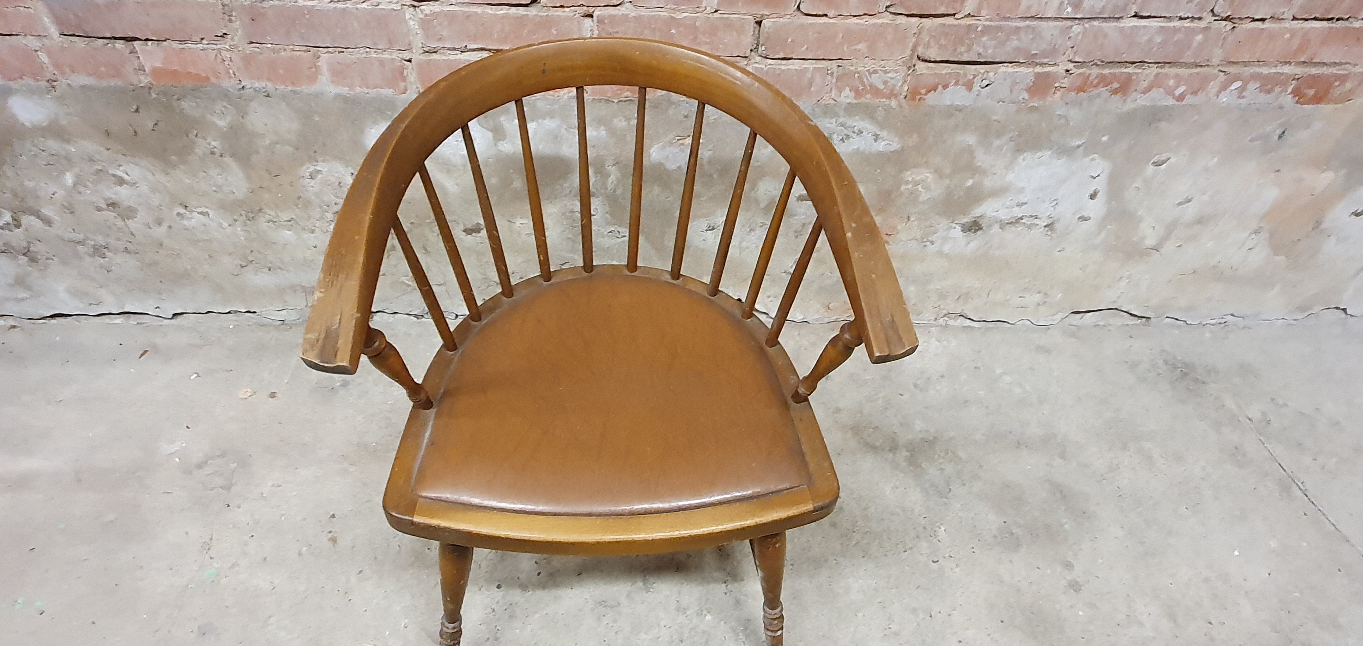 Vintage office armchair with Scandinavian style bar