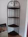Corner furniture in iron with shelves.