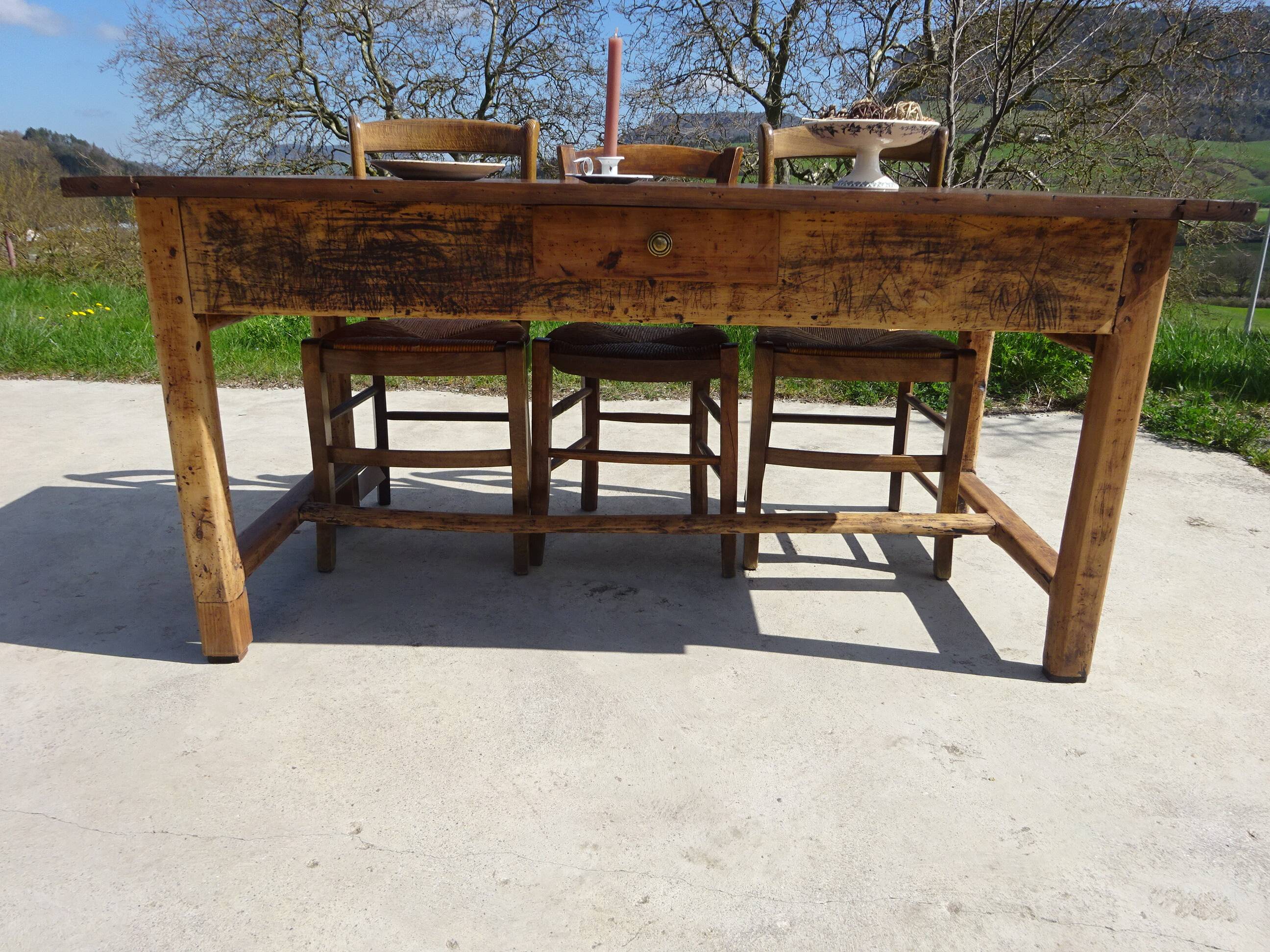 Old farmhouse table made entirely of restored solid oak.